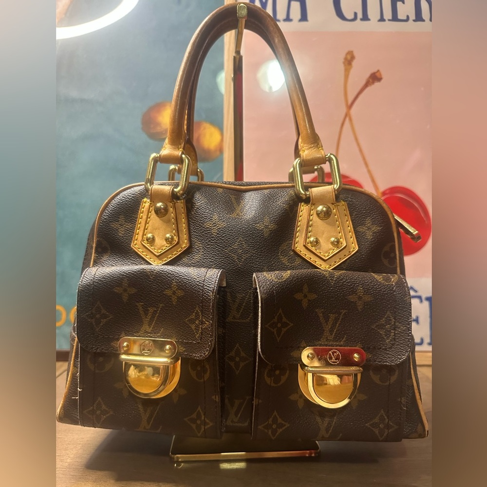 Louis Vuitton Monogram Manhattan Top Handle Leather Bag In Brown